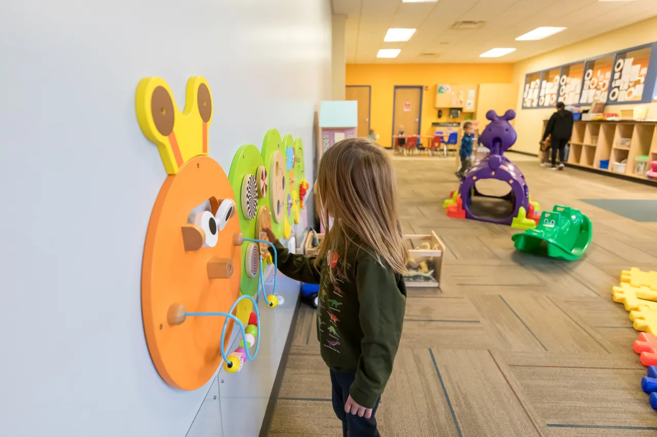 child playing in YMCA Child Watch